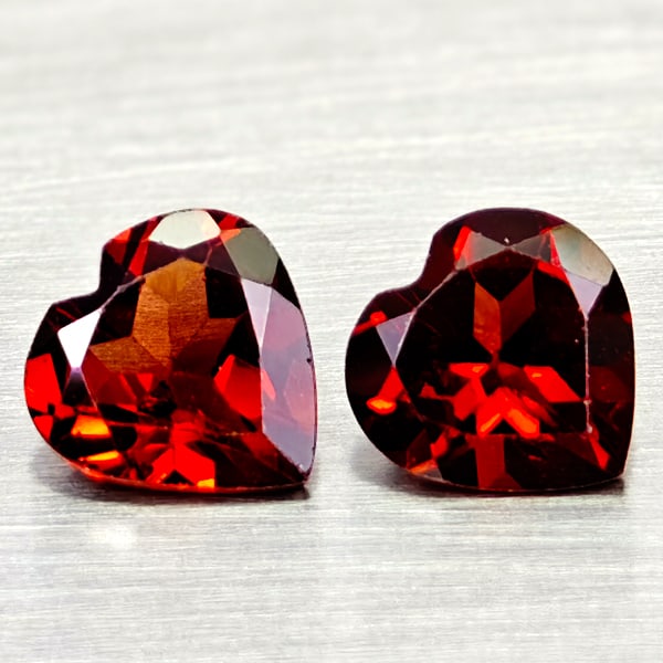 Natural Orangish Red Garnet 2.36 Ct. 2 Pcs. Heart Shape 7.1 x 6.9 Mm.: Product ID: 802936642 Product Name: Natural Red Garnet Weight: 2.36 CT. Size: 7.1 x 6.9 x 3.4 MM. Shape: Heart Shape Color: Orangish Red Clarity:VSI Luster: Good Gems Origin: Tanzania Treatment: Unhea