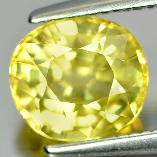 Natural Yellow Sapphire Gemstones 1.77 Ct. Oval Shape 7 x 6.5 Mm.: Product ID: 806153285 Product Name: Natural Yellow Sapphire Weight: 1.77 CT. Size: 7 x 6.5 x 4.3 MM. Shape: Oval Color: Yellow Clarity:VSI Luster: Good Gems Origin: Thailand Treatment: Heated Crystal 