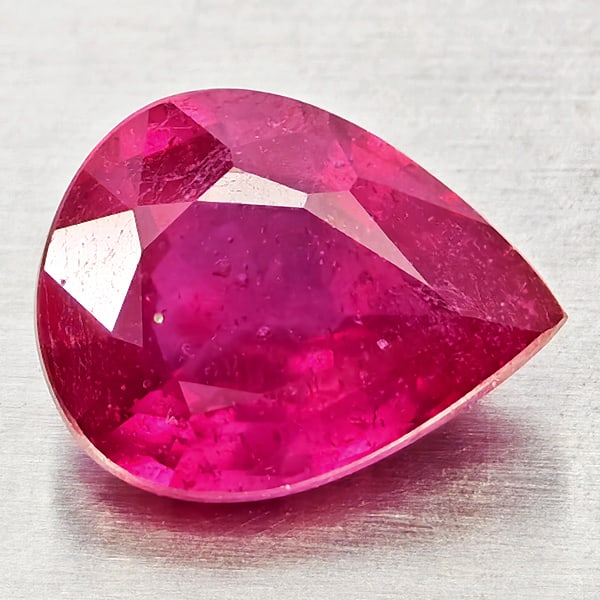 Natural Purplish Red Ruby Gemstones 2.06 Ct. Pear Shape 9 x 7 Mm.: Product ID: 805935584 Product Name: Natural Ruby Weight: 2.06 CT. Size: 9 x 7 x 4 MM. Shape: Pear Shape Color: Purplish Pink Clarity:VSI - SI1 Luster: Good Gems Origin: Madagascar Treatment: Heated (L