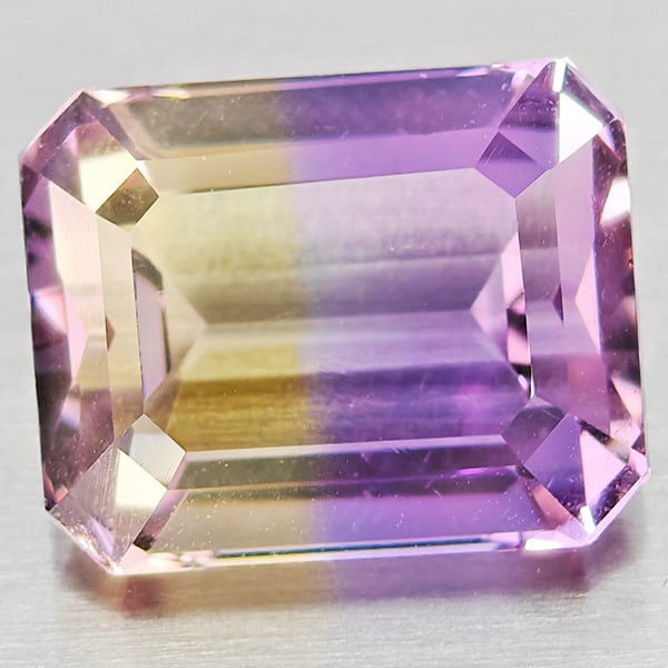 Natural Bi Color Ametrine Gemstones 3.81 Ct. Octagon Shape 10.1 x 8.1 Mm.: Product ID: 800408434 Product Name: Natural Ametrine Weight: 3.81 CT. Size: 10.1 x 8.1 x 6 MM. Shape: Octagon Color: Bi Color Clarity:VSI Luster: Good Gems Origin: Bolivia Treatment: Unheated Crystal 