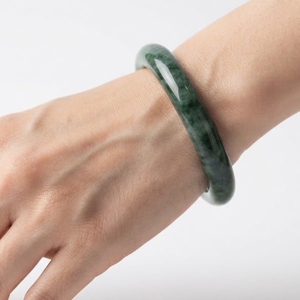 Natural Multi Color Green Color Jade Gemstones 284.65 Ct. Bangle Round Cabochon Diameter 52 Mm.: Product ID: 819815221 Product Name: Natural Jade Weight: 284.65 CT. Size: 73 x 52 x 10 MM. Shape: Round Cabochon Color: Green Clarity:Opaque Luster: Good Gems Origin: Thailand Treatment: Unheated Crys