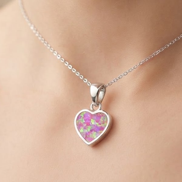 925 Sterling Silver Pendant with Multi Color Created Opal Heart Shape 3.08 G.: Product ID: 280130011 Product Name: Sterling Silver Pendant Product Type: 925 Sterling Silver Fine Jewelry Jewelry Weight: 3.08 Grams. Gemstones Color: Multi-Color Metal: Solid Silver 92.5%. Gemstone 