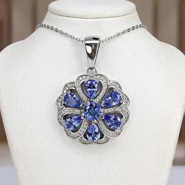 Natural Purple Tanzanite with 925 Sterling Silver Pendant Jewelry 5.35 Grams: Product ID: 808500367 Product Type: 925 Sterling Silver Fine Jewelry Jewelry Weight: 5.35 Grams. Gemstones Color: Purple Metal: Solid Silver 92.5%. Gemstone Detail: Tanzanite At Your Service: At Treas