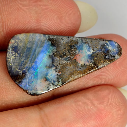 Natural Multi Color Flashing Boulder Opal Gemstones 19.77 Ct. Free Form Cabochon Shape 32 x 17 Mm.: Product ID: 818727181 Product Name: Natural Opal Weight: 19.77 CT. Size: 32 x 17 x 5 MM. Shape: Free Form Cabochon Color: Multi-Color Clarity:Opaque Luster: Iridescent Gems Origin: Queensland Australi