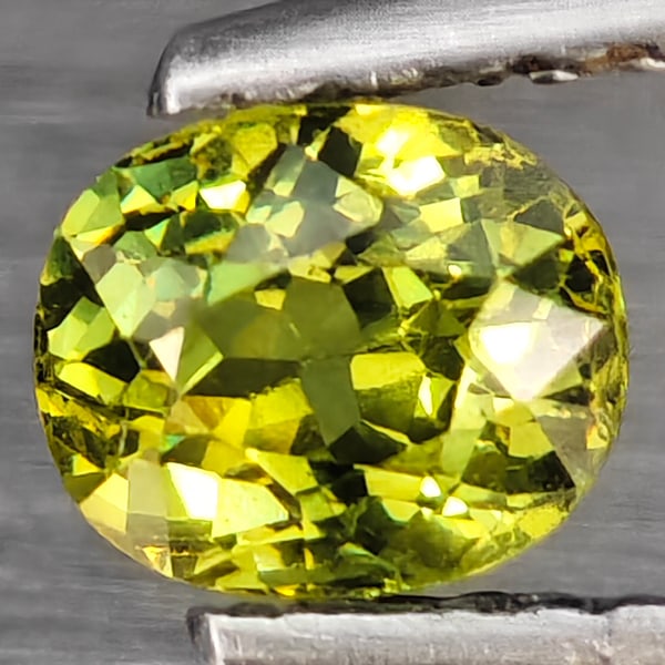 Natural Yellowish Green Demantoid Garnet Gemstones 0.65 Ct. Oval Shape 5.2 x 4.3 Mm. (1 of 3)