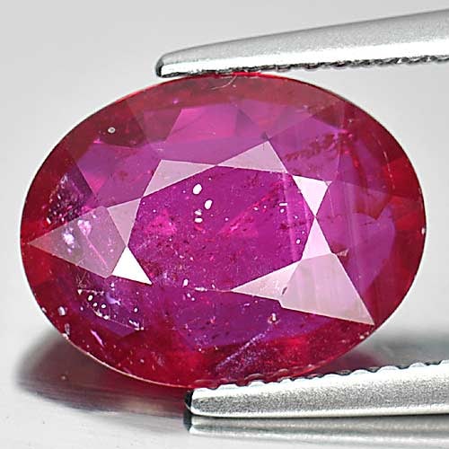 Natural Purplish Red Ruby Gemstones 3.95 Ct. Oval Shape 11.9 x 9.3 Mm.: Product ID: 805925172 Product Name: Natural Ruby Weight: 3.95 CT. Size: 11.9 x 9.3 x 3.6 MM. Shape: Oval Color: Purplish Red Clarity:VSI Luster: Good Gems Origin: Mozambique Treatment: Heated (Lead-gl