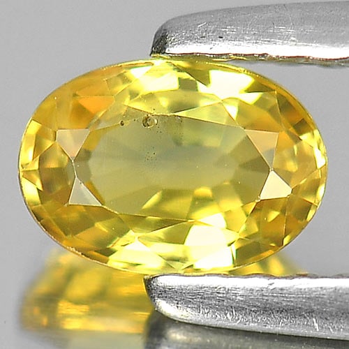Natural Yellow Sapphire Gemstones 0.67 Ct. Oval Shape 6 x 4.2 Mm.: Product ID: 806158819 Product Name: Natural Yellow Sapphire Weight: 0.67 CT. Size: 6 x 4.2 x 2.8 MM. Shape: Oval Color: Yellow Clarity:VSI Luster: Good Gems Origin: Madagascar Treatment: Heated Crysta