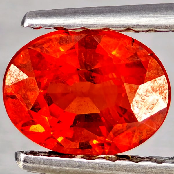 Natural Orangish Red Spessartine Garnet Gemstones 0.86 Ct. Oval Shape 6.2 x 4.8 Mm.: Product ID: 802937280 Product Name: Natural Garnet Weight: 0.86 CT. Size: 6.2 x 4.8 x 3.3 MM. Shape: Oval Shape Color: Orangish Red Clarity:SI1 Luster: Good Gems Origin: Namibia Treatment: Unheated Cr