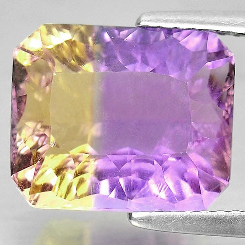 Natural Bi Color Ametrine Gemstones 6.89 Ct. Clean Octagon Millennium Cut 12.2 x 10.2 Mm.: Product ID: 800408012 Product Name: Natural Ametrine Weight: 6.89 CT. Size: 12.2 x 10.2 x 7.3 MM. Shape: Octagon Millennium Cut Color: Bi Color Clarity:IF Luster: Very Good Gems Origin: Bolivia Treatm