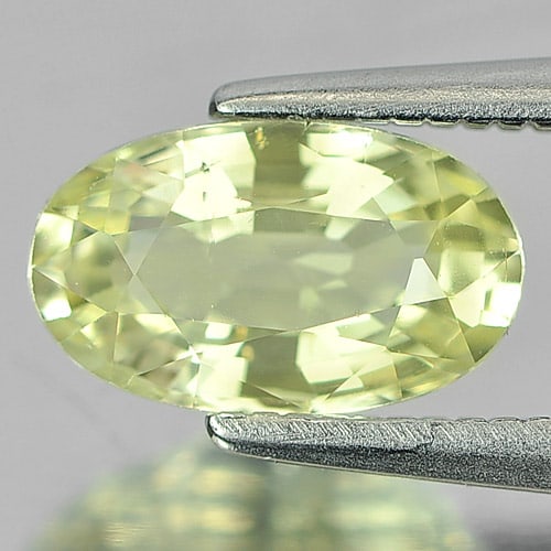 Natural Yellow Chrysoberyl Gemstones 1.46 Ct. Oval Shape 8.7 x 5.2 Mm.: Product ID: 801701104 Product Name: Natural Chrysoberyl Weight: 1.46 CT. Size: 8.7 x 5.2 x 3.8 MM. Shape: Oval Color: Yellow Clarity:VSI Luster: Very Good Gems Origin: Madagascar Treatment: Unheated C