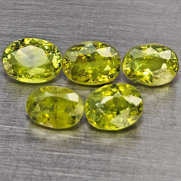 Natural Green Demantiod Garnet Gemstones 1.03 Ct. 5 Pcs. Oval Shape 4 x 3 Mm.: Product ID: 802937610 Product Name: Natural Demantoid Weight: 1.03 CT. Size: 4 x 3 x 2 MM. Shape: Oval Shape Color: Green Clarity:SI1 Luster: Good Gems Origin: Madagascar Treatment: Unheated Crystal S