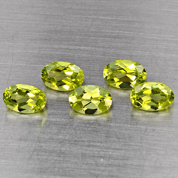 Natural Green Peridot Gemstones 2.76 Ct. 5 Pcs. Oval Shape 6 x 4 Mm.: Product ID: 805317743 Product Name: Natural Peridot Weight: 2.76 CT. Size: 6 x 4 x 3.4 MM. Shape: Oval Shape Color: Green Clarity:VSI Luster: Good Gems Origin: Pakistan Treatment: Unheated Crystal Str