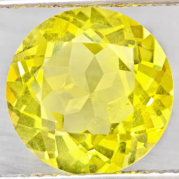 Natural Yellow Lemon Quartz Gemstones 3.44 Ct. Round Shape 10.1 Mm.: Product ID: 805530140 Product Name: Natural Quartz Weight: 3.44 CT. Size: 10.1 x 10.1 x 6 MM. Shape: Round Color: Yellow Lemon Clarity:VSI Luster: Good Gems Origin: Brazil Treatment: Unheated Crystal 