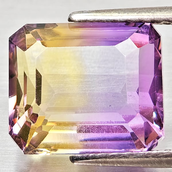 Natural Bi Color Ametrine Gemstones 4.40 Ct. Octagon Shape 10.5 x 8.8 Mm.: Product ID: 800408306 Product Name: Natural Ametrine Weight: 4.40 CT. Size: 10.5 x 8.8 x 6.1 MM. Shape: Octagon Color: Bi Color Clarity:VSI Luster: Good Gems Origin: Bolivia Treatment: Unheated Crysta