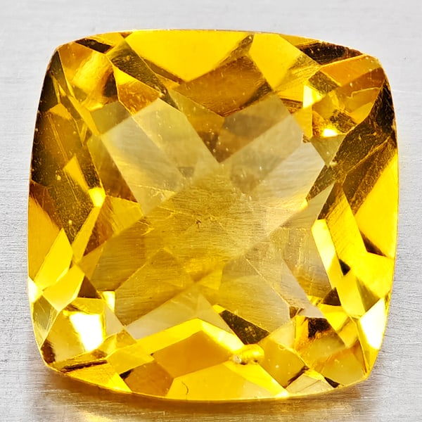 Natural Yellow Citrine Gemstones 3.84 Ct. Cushion Checkerboard Cut 9.9 Mm.: Product ID: 801815201 Product Name: Natural Citrine Weight: 3.84 CT. Size: 9.9 x 9.9 x 6.6 MM. Shape: Cushion Checkerboard Cut Color: Yellow Clarity:VVS - VSI Luster: Good Gems Origin: Brazil Treatmen