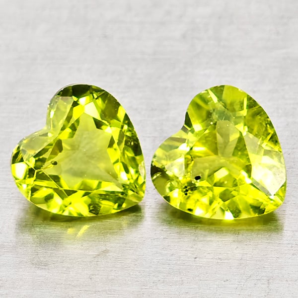 Natural Green Peridot Gemstones 1.66 Ct. 2 Pcs. Heart Shape 6.2 x 6.2 Mm.: Product ID: 805317316 Product Name: Natural Peridot Weight: 1.66 CT. Size: 6.2 x 6.2 x 3.4 MM. Shape: Heart Shape Color: Green Clarity:VSI - SI1 Luster: Good Gems Origin: Pakistan Treatment: Unheated 
