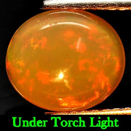 Natural Multi-Color Play Of Colour Opal Gemstones 1.65 Ct. Oval Cabochon Shape 9.4 x 8.2 Mm.: Product ID: 818723825 Product Name: Natural Opal Weight: 1.65 CT. Size: 9.4 x 8.2 x 3.9 MM. Shape: Oval Cabochon Color: Multi-Color Clarity:Semi - Transparent Luster: Strong Iridescent Gems Origin: Et
