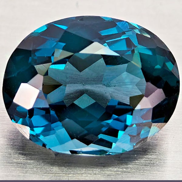 Natural London Blue Topaz Gemstones 4.38 Ct. Oval Shape 8.3 x 10.6 Mm.: Product ID: 807168413 Product Name: Natural Blue Topaz Weight: 4.38 CT. Size: 8.6 x 10.6 x 6.7 MM. Shape: Oval Color: London Blue Clarity:VVS - VSI Luster: Very Good Gems Origin: Brazil Treatment: Tre