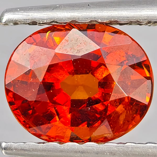 Natural Orangish Red Spessartine Garnet Gemstones 1.13 Ct. Oval Shape 6.5 x 5.5 Mm.: Product ID: 802937210 Product Name: Natural Garnet Weight: 1.13 CT. Size: 6.5 x 5.5 x 3.7 MM. Shape: Oval Shape Color: Orangish Red Clarity:SI1 Luster: Good Gems Origin: Namibia Treatment: Unheated Cr