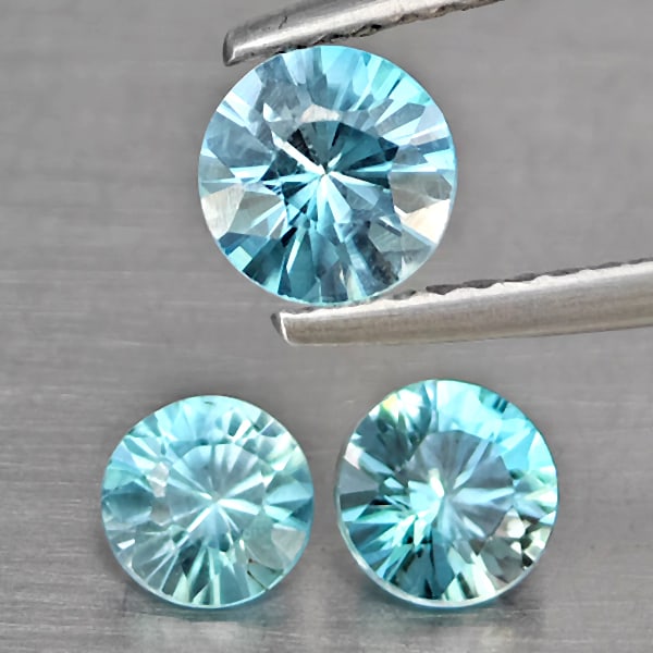 Natural Blue Zircon Gemstones 1.95 Ct. 3 Pcs Round Diamond Cut 4.2 Mm.: Product ID: 807743259 Product Name: Natural Gemstones Weight: 1.95 CT. Size: 4.2 x 4.2 x 3.1 MM. Shape: Round Diamond Cut Color: Blue Clarity:SI1 Luster: Good Gems Origin: Cambodia Treatment: Heated C