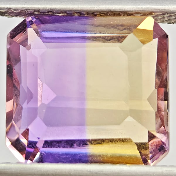 Natural Bi Color Ametrine Gemstones 4.71 Ct. Octagon Shape 12.9 x 9.8 Mm.: Product ID: 800408606 Product Name: Natural Ametrine Weight: 4.71 CT. Size: 10.4 x 9.7 x 5.9 MM. Shape: Octagon Color: Bi Color Clarity:VVS Luster: Good Gems Origin: Bolivia Treatment: Unheated Crysta