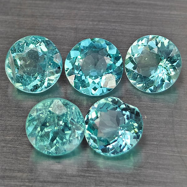 Natural Paraiba Color Apatite Gemstones 2.66 Ct. 5 Pcs. Round Shape 5.1 Mm.: Product ID: 800613773 Product Name: Natural Apatite Weight: 2.66 CT. Size: 5.1 x 5.1 x 3.3 MM. Shape: Round Color: Paraiba Color Clarity:SI1 Luster: Good Gems Origin: Tanzania Treatment: Unheated Crys