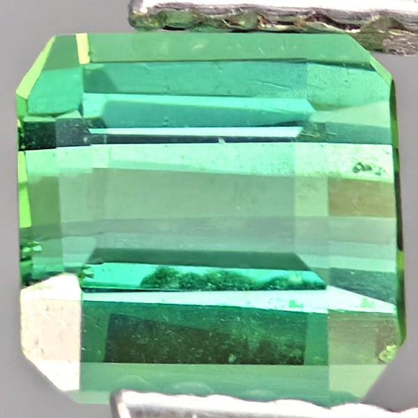 Natural Green Tourmaline Gemstones 1.01 Ct. Octagon Shape 4.9 x 4.9 Mm.: Product ID: 807251071 Product Name: Natural Tourmaline Weight: 1.01 CT. Size: 4.9 x 4.9 x 3.8 MM. Shape: Octagon Color: Green Clarity:SI1 Luster: Good Gems Origin: Nigeria Treatment: Unheated Crystal 
