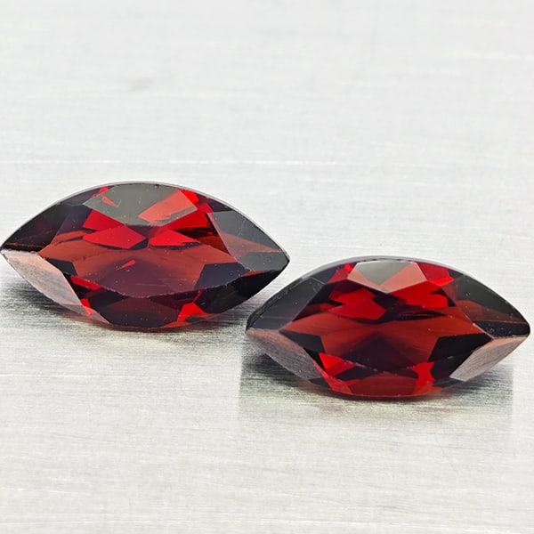 Natural Orangish Red Garnet Gemstones 2.81 Ct. 2 Pcs. Marquise Shape and Mixed Size: Product ID: 802937008 Product Name: Natural Garnet Weight: 2.81 CT. Size: 4.9 x 9.8 x 3.5 to 5.2 x 10.1 x 3.5 MM. Shape: Marquise Shape Color: Orangish Red Clarity:VVS - VSI Luster: Good Gems Origin: 