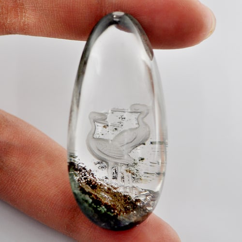 Natural White Quartz Gemstones 100.00 Ct. Birds Carving Inner Pear Cabochon Shape 47 x 22 Mm.: Product ID: 805527044 Product Name: Natural Quartz Weight: 100.00 CT. Size: 47 x 22 x 17 MM. Shape: Pear Cabochon Color: White Clarity:Semi - Transparent Luster: Good Gems Origin: Thailand Treatment: 