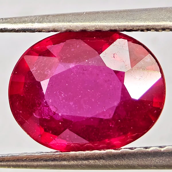 Natural Purplish Red Ruby Gemstones 2.11 Ct. Oval Shape 9.1 x 7.3 Mm.: Product ID: 805935615 Product Name: Natural Ruby Weight: 2.11 CT. Size: 9.1 x 7.3 x 3.8 MM. Shape: Oval Color: Purplish Red Clarity:VSI Luster: Good Gems Origin: Madagascar Treatment: Heated (Lead-gla