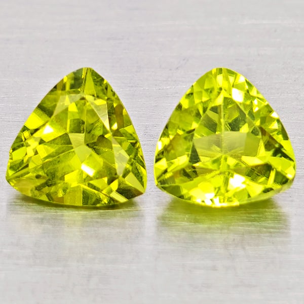 Natural Green Peridot Gemstones 1.67 Ct. 2 Pcs. Trilliant Shape 6 Mm.: Product ID: 805317566 Product Name: Natural Peridot Weight: 1.67 CT. Size: 6 x 6 x 3.7 MM. Shape: Trilliant Color: Green Clarity:SI1 Luster: Good Gems Origin: Pakistan Treatment: Unheated Crystal Stru