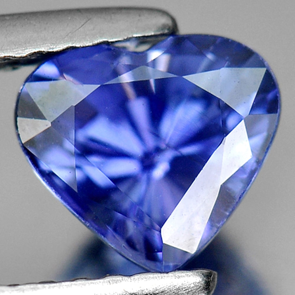 Natural Violetish Blue Tanzanite Gemstones 1.28 Ct. Heart Shape 6.7 x 6 Mm.: Product ID: 807009115 Product Name: Natural Tanzanite Weight: 1.28 CT. Size: 6.7 x 6 x 5 MM. Shape: Heart Color: Violetish Blue Clarity:VVS Luster: Very Good Gems Origin: Tanzania Treatment: Heated Cr