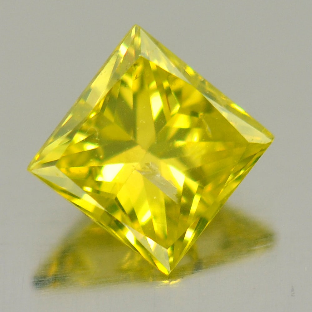 Natural Yellow Loose Diamond 0.16 Ct. Square Princess Cut 3 Mm.: Product ID: 802103709 Product Name: Natural Enhanced Diamond Weight: 0.16 CT. Size: 3 x 3 x 2 MM. Shape: Square Princess Cut Color: Yellow Clarity:SI1 Luster: Good Gems Origin: Belgium Treatment: Trea