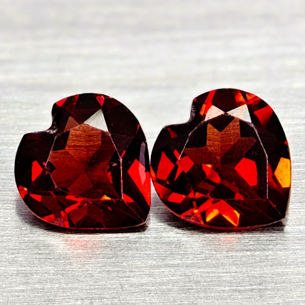 Natural Purplish Red Rhodolite Garnet Gemstones 1.49 Ct. 2 Pcs. Heart Shape 6 x 5.8 Mm.: Product ID: 802936665 Product Name: Natural Rhodolite Weight: 1.49 CT. Size: 6 x 5.8 x 3.2 MM. Shape: Heart Shape Color: Purplish Red Clarity:VSI Luster: Good Gems Origin: Madagascar Treatment: Unheat