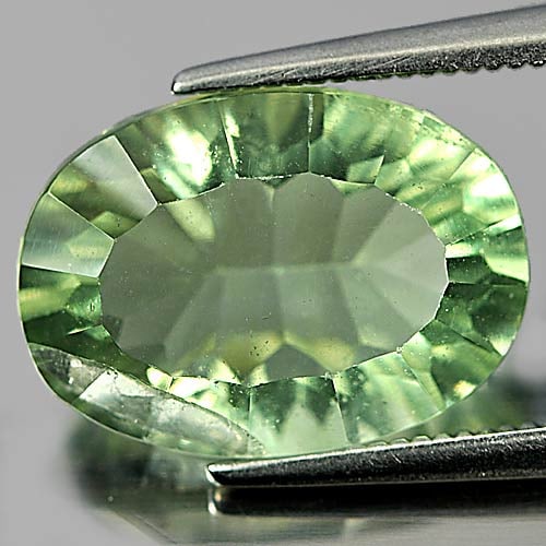 Natural Green Fluorite Gemstones 6.28 Ct. Oval Concave Cut 14 x 10 Mm.: Product ID: 802704564 Product Name: Natural Fluorite Weight: 6.28 CT. Size: 14 x 10.2 x 6.4 MM. Shape: Oval Concave Cut Color: Green Clarity:SI1 Luster: Good Gems Origin: Brazil Treatment: Unheated Cr