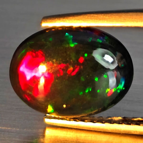 Natural Multi Color Play Of Colour Opal Gemstones 1.77 Ct. Oval Cabochon Shape 12.3 x 10.1 Mm. (1 of 3)