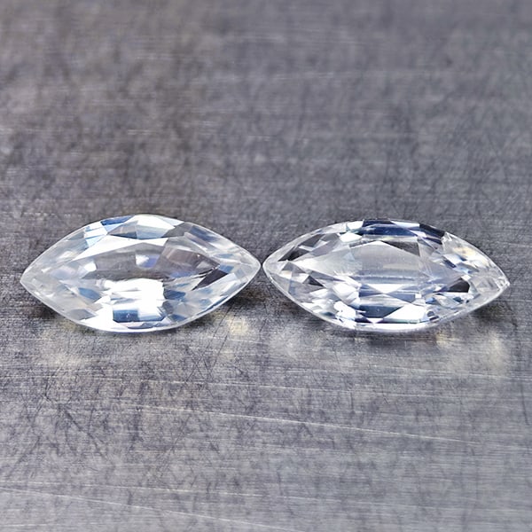 Natural White Zircon Gemstones 1.87 Ct. 2 Pcs. Marquise Shape 8 x 4 Mm.: Product ID: 807742881 Product Name: Natural Zircon Weight: 1.87 CT. Size: 8 x 4.2 x 2.8 MM. Shape: Marquise Color: White Clarity:VSI Luster: Very Good Gems Origin: Cambodia Treatment: Heated Crystal S