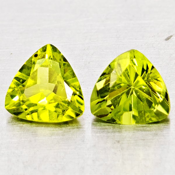 Natural Green Peridot Gemstone 1.80 Ct. 2 Pcs. Trilliant Shape 6 Mm.: Product ID: 805317539 Product Name: Natural Peridot Weight: 1.80 CT. Size: 6 x 6 x 4.8 MM. Shape: Trilliant Color: Green Clarity:SI1 Luster: Good Gems Origin: Pakistan Treatment: Unheated Crystal Stru