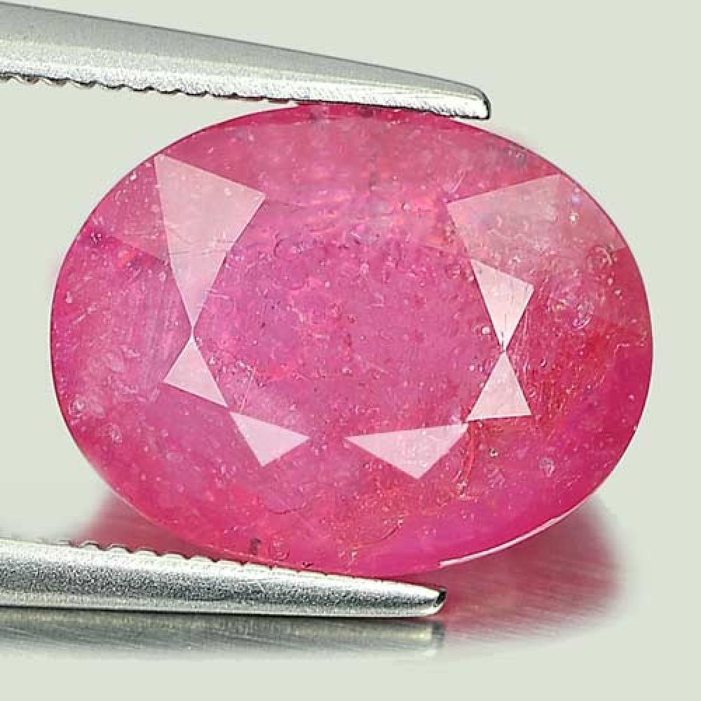 Natural Reddish Pink Ruby Gemstones 7.12 Ct. Oval Shape 13 x 10.2 Mm.: Product ID: 805917693 Product Name: Natural Ruby Weight: 7.12 CT. Size: 13 x 10.2 x 5.5 MM. Shape: Oval Color: Pink Clarity:SI1 Luster: Good Gems Origin: Mozambique Treatment: Heated Lead-glass fillin