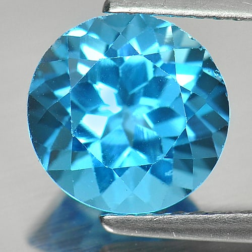 Natural Swiss Blue Topaz Gemstones 3.17 Ct. Round Shape 8.9 Mm.: Product ID: 807157059 Product Name: Natural Blue Topaz Weight: 3.17 CT. Size: 8.9 x 8.9 x 6.1 MM. Shape: Round Color: Swiss Blue Clarity:SI1 Luster: Good Gems Origin: Brazil Treatment: Treated Crystal