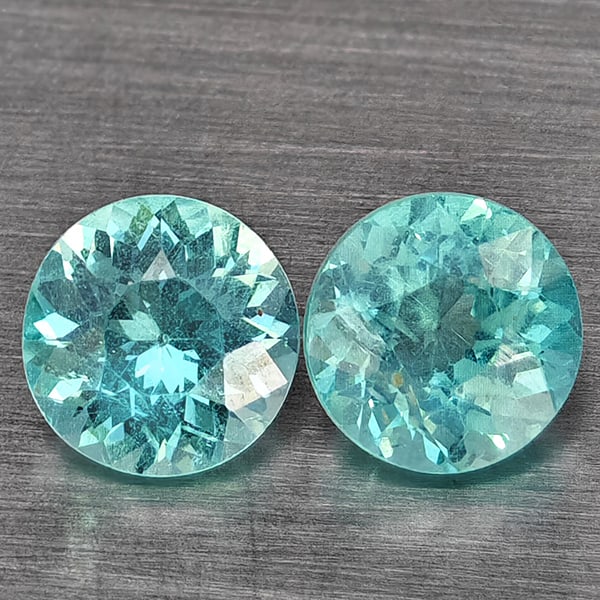 Natural Paraiba Apatite Gemstones 1.20 Ct. 2 Pcs Round Shape 5.3 Mm.: Product ID: 800613755 Product Name: Natural Apatite Weight: 1.20 CT. Size: 5.3 x 5.3 x 3.3 MM. Shape: Round Color: Paraiba Color Clarity:SI1 Luster: Good Gems Origin: Tanzania Treatment: Unheated Crys