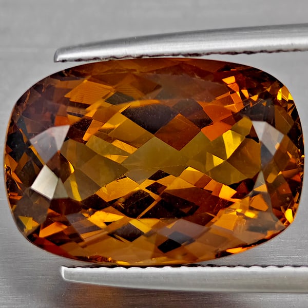 Natural Imperial Topaz Gemstones 13.14 Ct. Cushion Shape 16.3 x 11.3 Mm.: Product ID: 807169087 Product Name: Natural Topaz Weight: 13.14 CT. Size: 16.3 x 11.3 x 8.3 MM. Shape: Cushion Shape Color: Imperial Clarity:VSI Luster: Good Gems Origin: Brazil Treatment: None Crysta