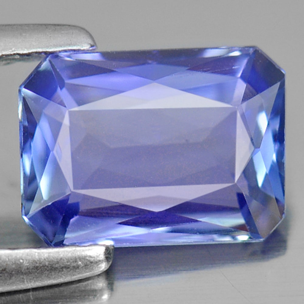 Natural Violetish Blue Tanzanite Gemstones 1.37 Ct. Clean Octagon Shape 8 x 5.8 Mm.: Product ID: 807006254 Product Name: Natural Tanzanite Weight: 1.37 CT. Size: 8 x 5.8 x 3 MM. Shape: Octagon Color: Violetish Blue Clarity:IF Luster: Good Gems Origin: Tanzania Treatment: Heated Crysta
