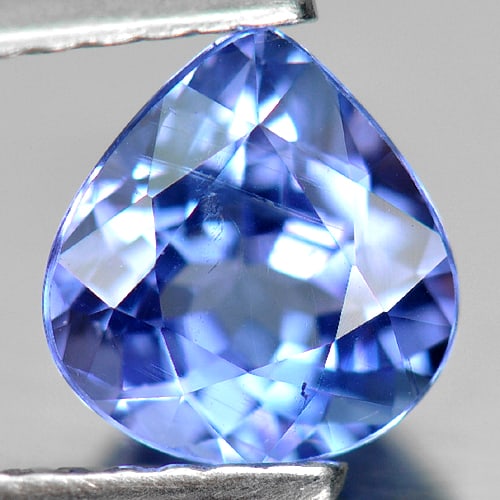 Natural Blue Tanzanite Gemstones 1.08 Ct. Pear Shape 6.98 x 6.57 Mm.: Product ID: 807005776 Product Name: Natural Tanzanite Weight: 1.08 CT. Size: 6.98 x 6.57 x 3.87 MM. Shape: Pear Color: Blue Clarity:VSI Luster: Good Gems Origin: Tanzania Treatment: Heated Crystal Str