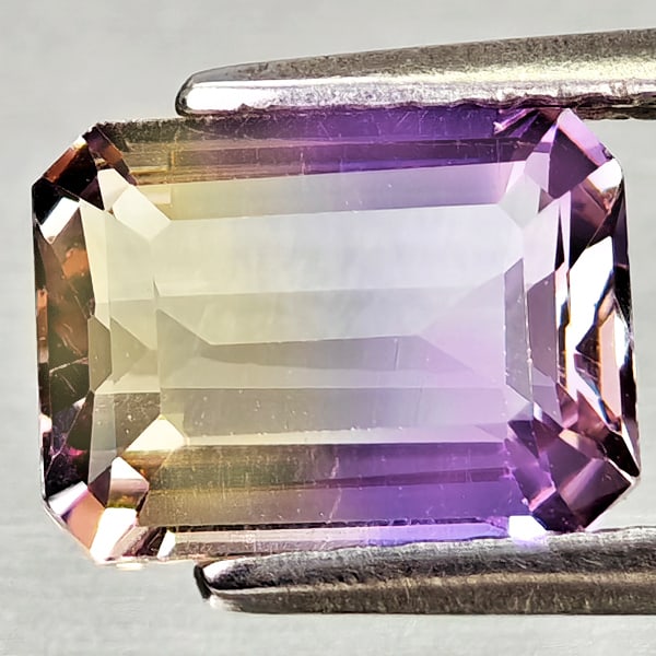 Natural Bi Color Ametrine Gemstones 1.61 Ct. Octagon Shape 8.2 x 6.2 Mm.: Product ID: 800408212 Product Name: Natural Ametrine Weight: 1.61 CT. Size: 8.2 x 6.2 x 4 MM. Shape: Octagon Color: Bi Color Clarity:VSI Luster: Very Good Gems Origin: Bolivia Treatment: Unheated Crys