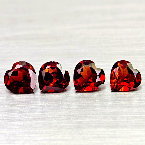Natural Orangish Red Garnet Gemstones 5.25 Ct. 4 Pcs. Heart Shape and Mixed Size: Product ID: 802936640 Product Name: Natural Red Garnet Weight: 5.25 CT. Size: 7 x 7 x 3.8 to 6.9 x 6.8 x 3.9 MM. Shape: Heart Shape Color: Orangish Red Clarity:VSI Luster: Good Gems Origin: Tanzania T