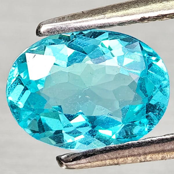 Natural Paraiba Color Apatite Gemstones 0.76 Ct. Oval Shape 7.1 x 5.2 Mm.: Product ID: 800613683 Product Name: Natural Apatite Weight: 0.76 CT. Size: 7.1 x 5.2 x 3.1 MM. Shape: Oval Color: Neon Blue Clarity:VSI Luster: Good Gems Origin: Tanzania Treatment: Unheated Crystal S