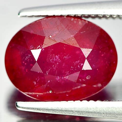 Natural Purplish Red Ruby Gemstones 3.59 Ct. Oval Shape 9.7 x 7.5 Mm.: Product ID: 805928008 Product Name: Natural Ruby Weight: 3.59 CT. Size: 9.7 x 7.5 x 5 MM. Shape: Oval Color: Purplish Red Clarity:VSI Luster: Good Gems Origin: Madagascar Treatment: Heated (Lead-glass
