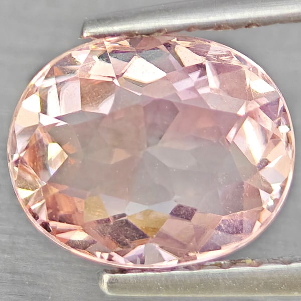 Natural Pinkish Peach Tourmaline Gemstones 1.40 Ct. Oval Shape 8 x 6.6 Mm.: Product ID: 807250991 Product Name: Natural Tourmaline Weight: 1.40 CT. Size: 8 x 6.6 x 4 MM. Shape: Oval Shape Color: Pinkish Peach Clarity:SI1 Luster: Good Gems Origin: Nigeria Treatment: Unheated C