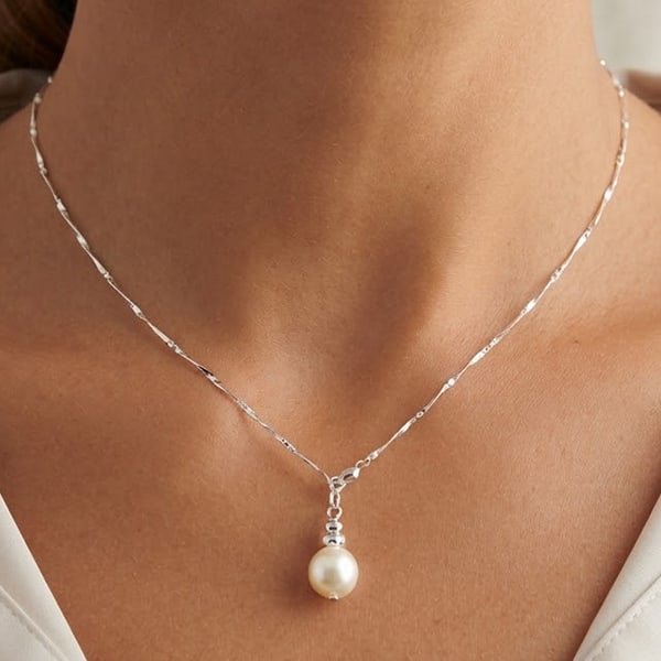 Natural White Pearl 925 Sterling Silver Necklace Jewelry 3.71 Grams Length 18 Inch.: Product ID: 805205517 Product Type: 925 Sterling Silver Fine Jewelry Jewelry Weight: 3.71 Grams. Gemstones Color: White Metal: Solid Silver 92.5%. Gemstone Detail: Center: Oval White Color Pearl Size 